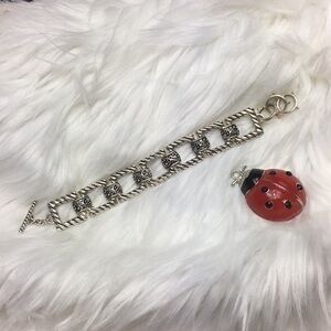 Scroll style, silver tone, 8” bracelet, NWOT.